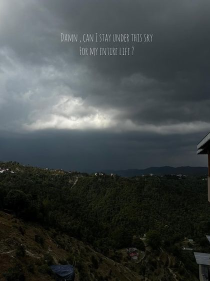 A dramatic, cloudy sky over the mountains. I love capturing the raw and powerful beauty of nature.