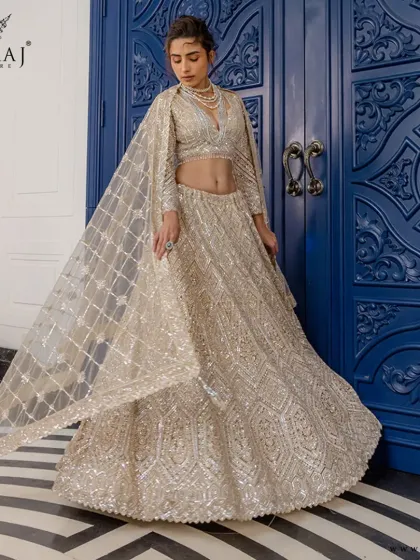 Meraj Couture - Luxury Occasion Wear Gilded & Golden Lehengas photo 22