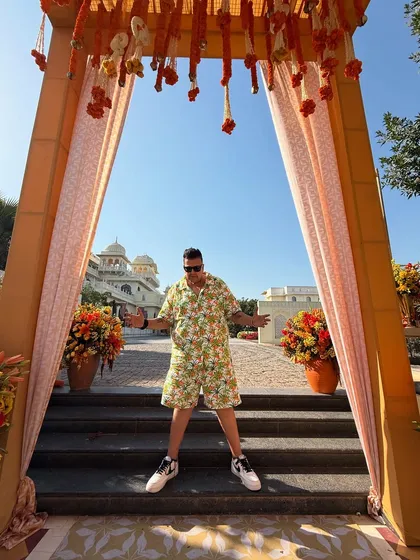 Framed by the beautiful floral entrance arch. Ready to make an entrance and start the party.