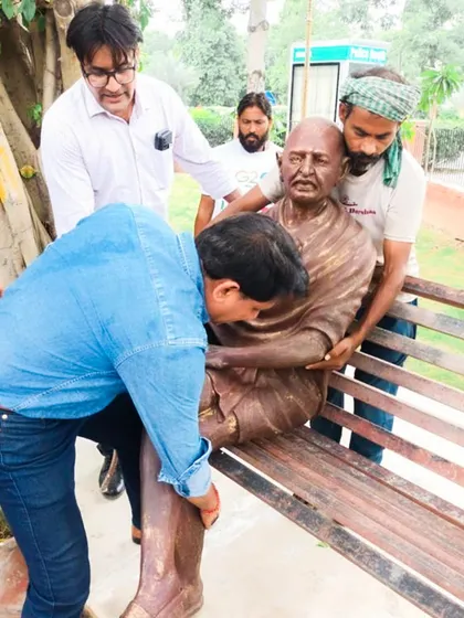 A behind-the-scenes moment during the installation of a Gandhi statue at Gandhi Smriti Park. This image captures the hands-on effort and dedication that goes into creating these significant public memorials.