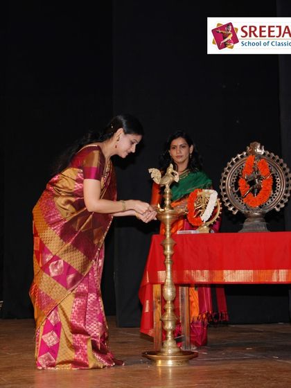 The auspicious lighting of the lamp to inaugurate Nrithya Sandhya. This ritual marks the beginning of our celebration of dance.