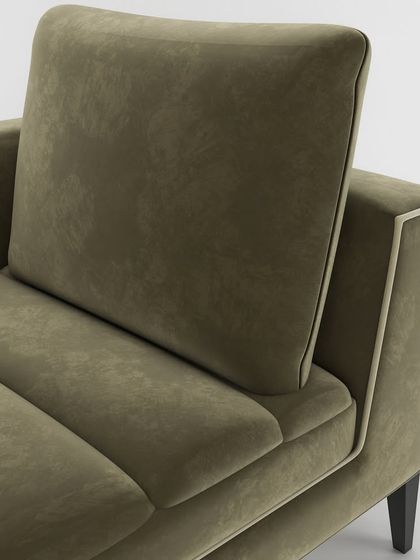 A close-up of the backrest cushion on our chaise lounge, showing the quality of the premium upholstery and the crisp piping that defines its shape.