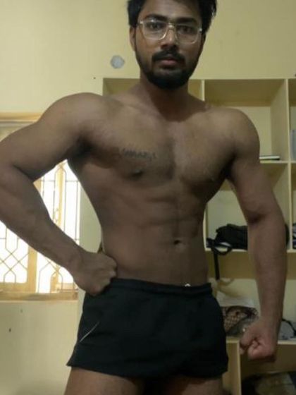 The "before" physique. This client started with a lean but small frame, ready to begin his muscle-building journey.