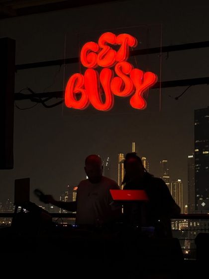 DJing against the Dubai skyline. Playing a rooftop set with the city lights behind me is a vibe of its own.