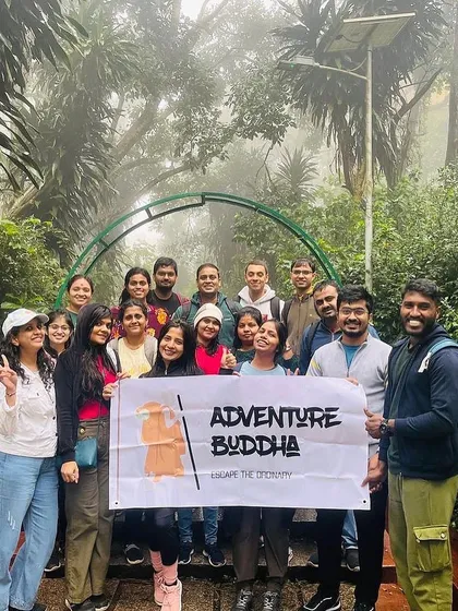 The group posing in the misty environs of Nandi Hills.