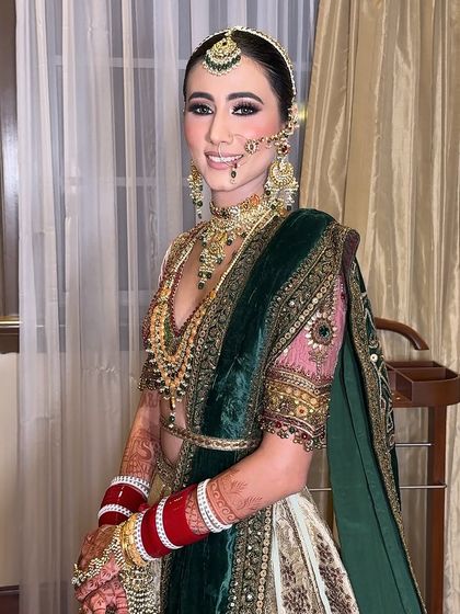 A smiling portrait of Harshita. Her joy and confidence are what make the look truly complete.