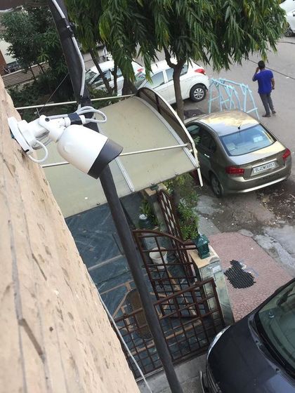 An outdoor camera positioned to monitor the street and entrance of a property. This is a key deterrent for criminals.