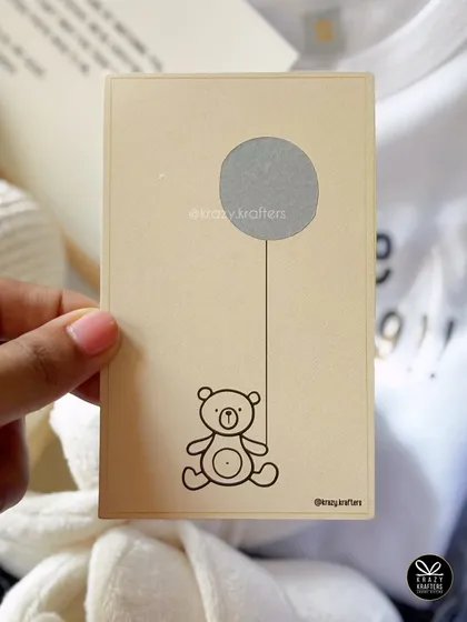 I also offer interactive scratch-off cards for a fun and surprising pregnancy reveal. This one features a cute teddy bear design.