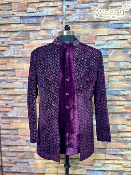 Our wine-colored velvet Jodhpuri suit, seen from the front. This three-piece set includes a textured jacket over a velvet kurta, offering a layered, regal look.