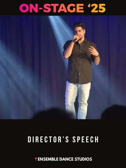 Our director addressing the audience during the 'ON-STAGE '25' showcase. We believe in connecting with our community and sharing the vision behind our programs.
