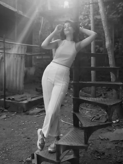 This set was shot around an old, rusty spiral staircase, using the location's texture and lines to create interesting compositions. The mix of color and B&W shows different ways to interpret the same scene.