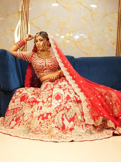 Explore our diverse collection of traditional red and pink bridal lehengas. Each piece, whether in rich velvet or silk, features unique embroidery and is designed to make your wedding day unforgettable.