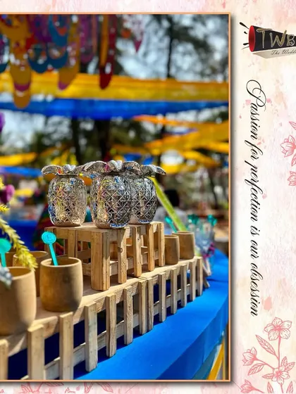 A stylish bar setup with unique glassware for the beachside wedding celebration in Goa.