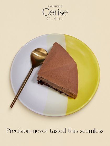 A slice of my Mochaccino entremet. The clean lines and seamless layers demonstrate the precision that goes into every creation. It is a taste that is as refined as its appearance.