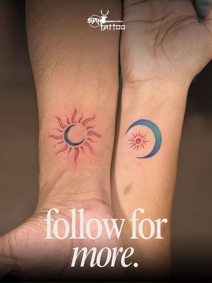 A beautiful couple tattoo for a 10th anniversary. One wrist has a sun with a moon inside, the other has a moon with a sun inside, symbolizing how they complete each other.