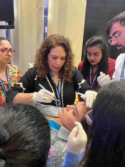 Hands-on experience is crucial in aesthetic medicine. Here I am conducting a live demonstration on Mono & Cog Threads at Aestheticon 2025, sharing advanced techniques with fellow doctors.