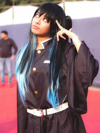 This photo captures the Muichiro cosplayer in a classic character pose. Our knowledge of anime and gaming helps us direct cosplayers to create photos that fans will instantly recognize and appreciate.