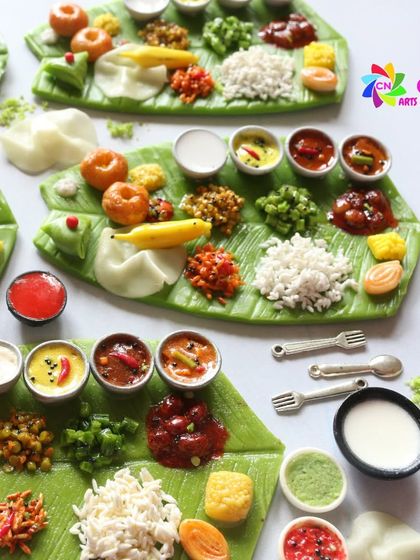 A beautiful close-up of an Andhra-style meal on a banana leaf, showing the vibrant colors and textures.
