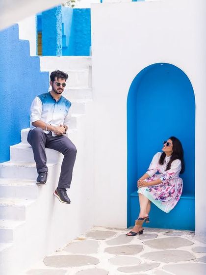 A more creative, posed shot using the architecture of the Santorini set. This shows how we can play with composition and angles to create unique images.