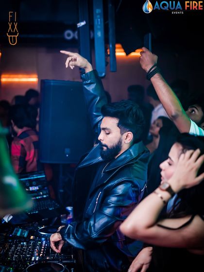 Pointing to the crowd, feeling the energy. It's a two-way street, I feed off the crowd's vibe and give it right back to them.