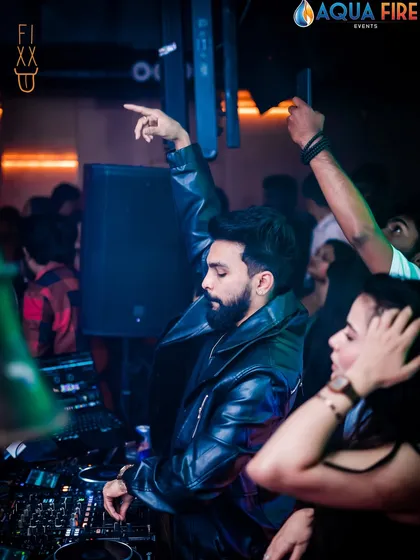 Pointing to the crowd, feeling the energy. It's a two-way street, I feed off the crowd's vibe and give it right back to them.