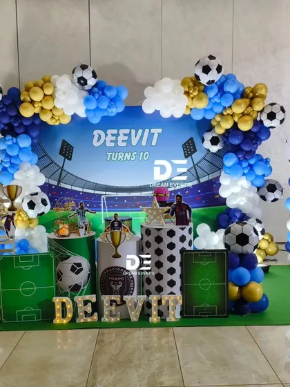 I love bringing unique party themes to life. For a young football fan's 10th birthday, I designed a complete stadium experience, including a themed backdrop, goalposts, player cutouts, and balloon pillars in team colors.