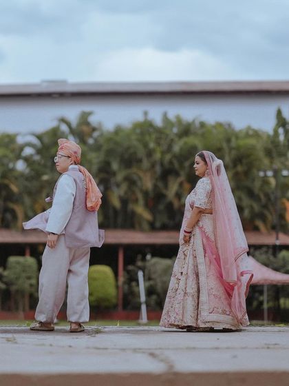Another angle of the couple's first look, capturing the emotion of the moment.