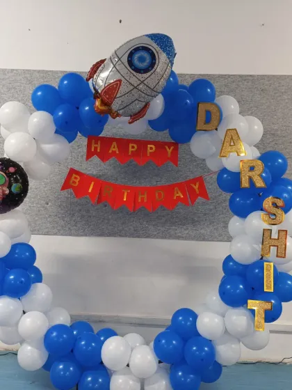 Our astronaut theme balloon ring is a great photo backdrop for kids' parties.