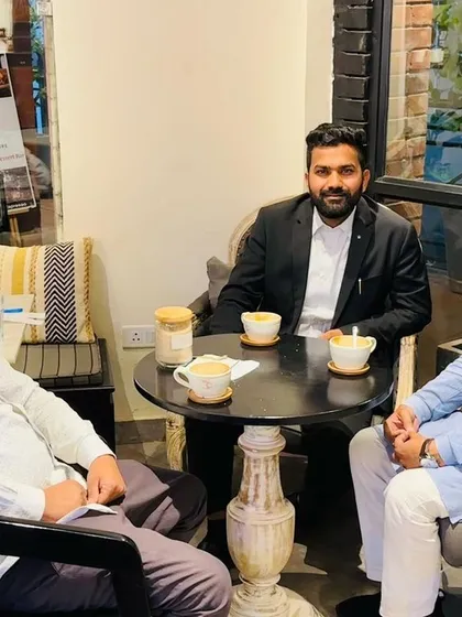 Catching up with Javed, Chairman of the Block Samiti in Tawadu, and other friends over coffee in Gurugram. Staying connected with local leaders is essential.