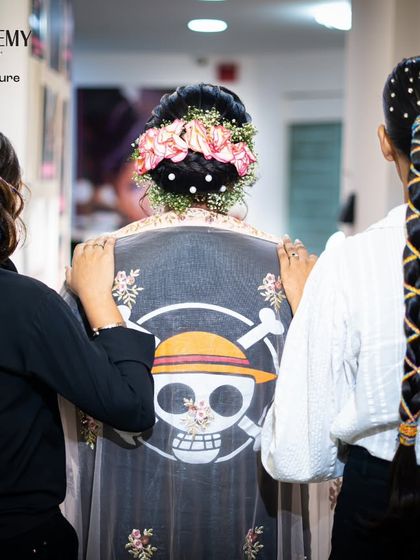 A group shot showing a variety of hairstyles created by our students, from intricate buns to long, decorated braids.