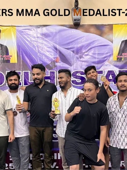 This is my team. My Tigers. Every medal and trophy here is earned through sweat and discipline. When you train with us, you become part of a family of champions.