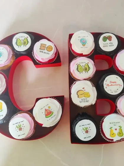 Make your company's initials or a special anniversary number stand out with our custom cupcake monograms. These are perfect for brand events, anniversaries, or team celebrations, offering a personalized and delicious centerpiece.