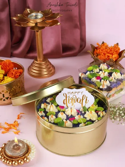 The Diwali sushi cake with a "Happy Diwali" tag. This adds a clear festive message and makes it an ideal shot for a brand's seasonal promotion.