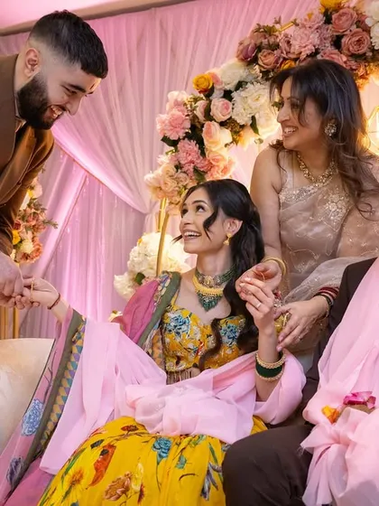Family members sharing a light-hearted moment during the ceremony. Our goal is to help create a joyful and stress-free atmosphere with our reliable catering.