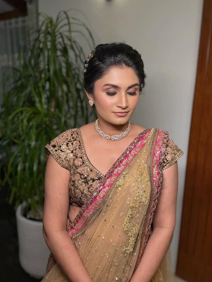 An eyes-closed shot to show the soft, shimmery eyeshadow work.