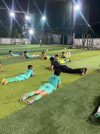 Peak performance starts with preparation. Our players go through a structured strength and conditioning session under the floodlights, focusing on youth football fitness to improve stamina and prevent injuries.