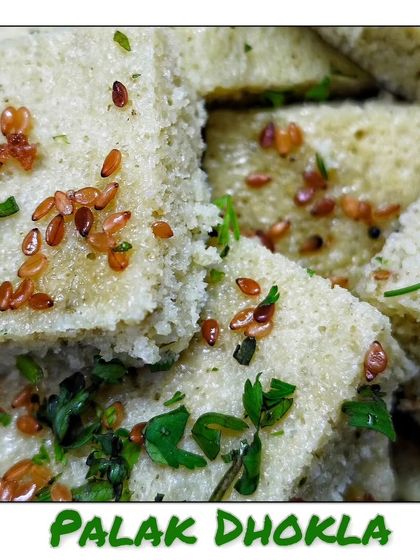 Soft and spongy Palak Dhokla, a healthy steamed snack made with spinach and tempered with mustard seeds.