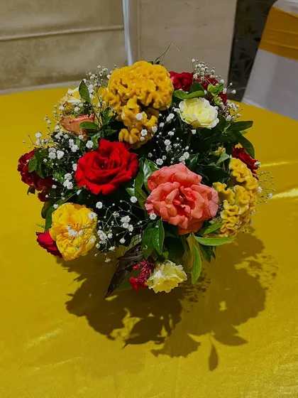 We also provide beautiful floral centerpieces for guest tables to match your event's decor and color scheme.