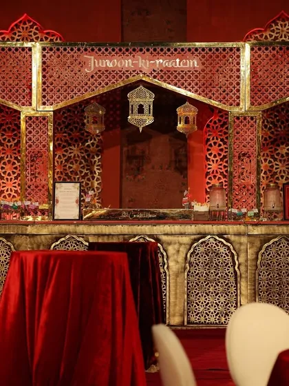 The bar was designed to be a centerpiece, featuring Mughal-style arches, intricate jali work, and hanging lanterns, with sections named 'Shehr-e-ishq' to enhance the romantic, city-of-love theme.