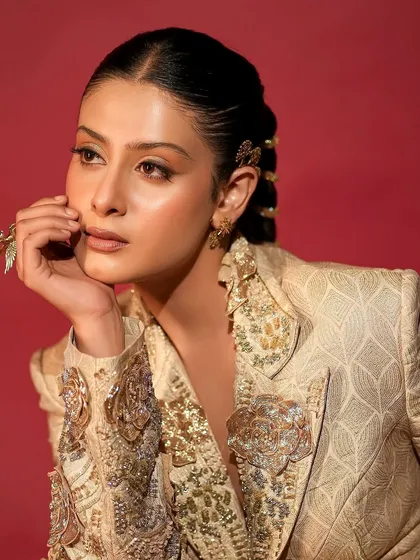 This editorial look for Isha Malviya combined a structured, embellished jacket with clean, sharp makeup. I focused on a graphic eyeliner and glowing, contoured skin, complemented by a sleek, modern hairstyle to complete the high-fashion aesthetic.