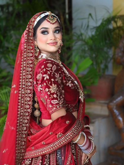 A classic portrait of the bride. The makeup is designed to enhance her features and look stunning in photographs.