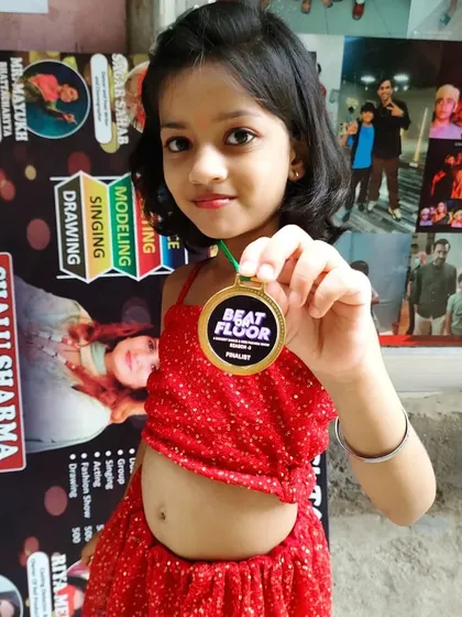 This little star became a finalist at the "Beat on the Floor" competition! We work hard to build confidence for solo performances, and her dedication really paid off.