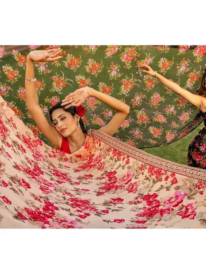 A creative shot for a collection of floral chiffon sarees. I used the fabric's light, airy quality to create a sense of movement and grace, with the models interacting with the flowing material.