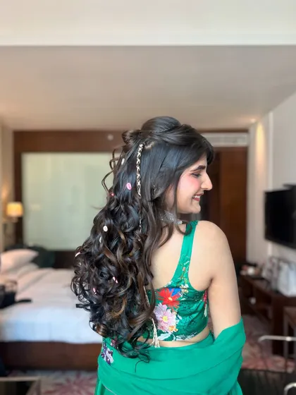 A candid side profile of the carnival hairstyle, showing the volume and texture that make this look so fun.