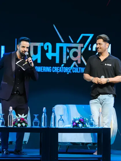Sharing a moment on stage with MS Dhoni during a panel discussion. My role is to facilitate conversation and maintain a dynamic energy between the panelists and the audience.
