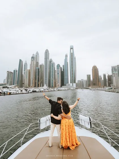 Celebrating their love on a private yacht, with the magnificent Dubai skyline as their witness. This shot captures the joy and grandeur of a destination pre-wedding adventure, a memory of them against the world.