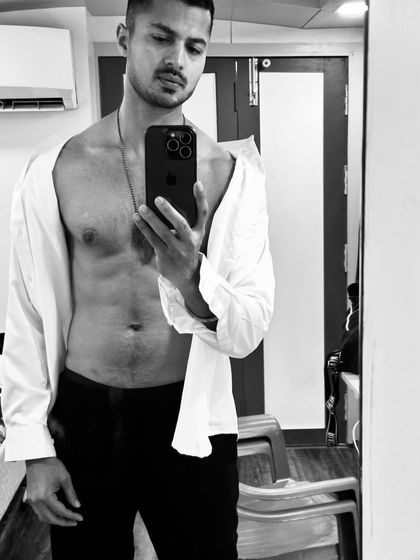 A quick selfie from the vanity room before a shoot. The life of a model often involves a lot of waiting, but staying ready is part of the job.