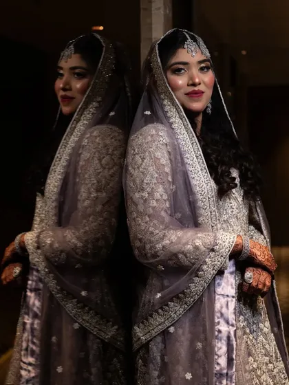 A creative bridal portrait using reflections to create a stunning and artistic image of the bride.