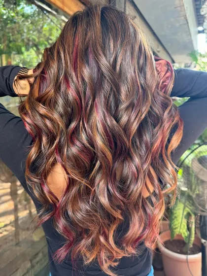 The back of the caramel and red peekaboo look, showing how the colors are beautifully woven together.