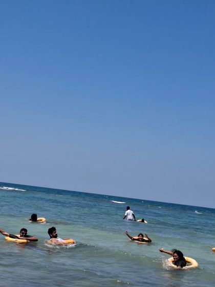 Floating effortlessly in the clear blue waters off the coast of Dhanushkodi. It's a perfect way to relax and beat the heat.
